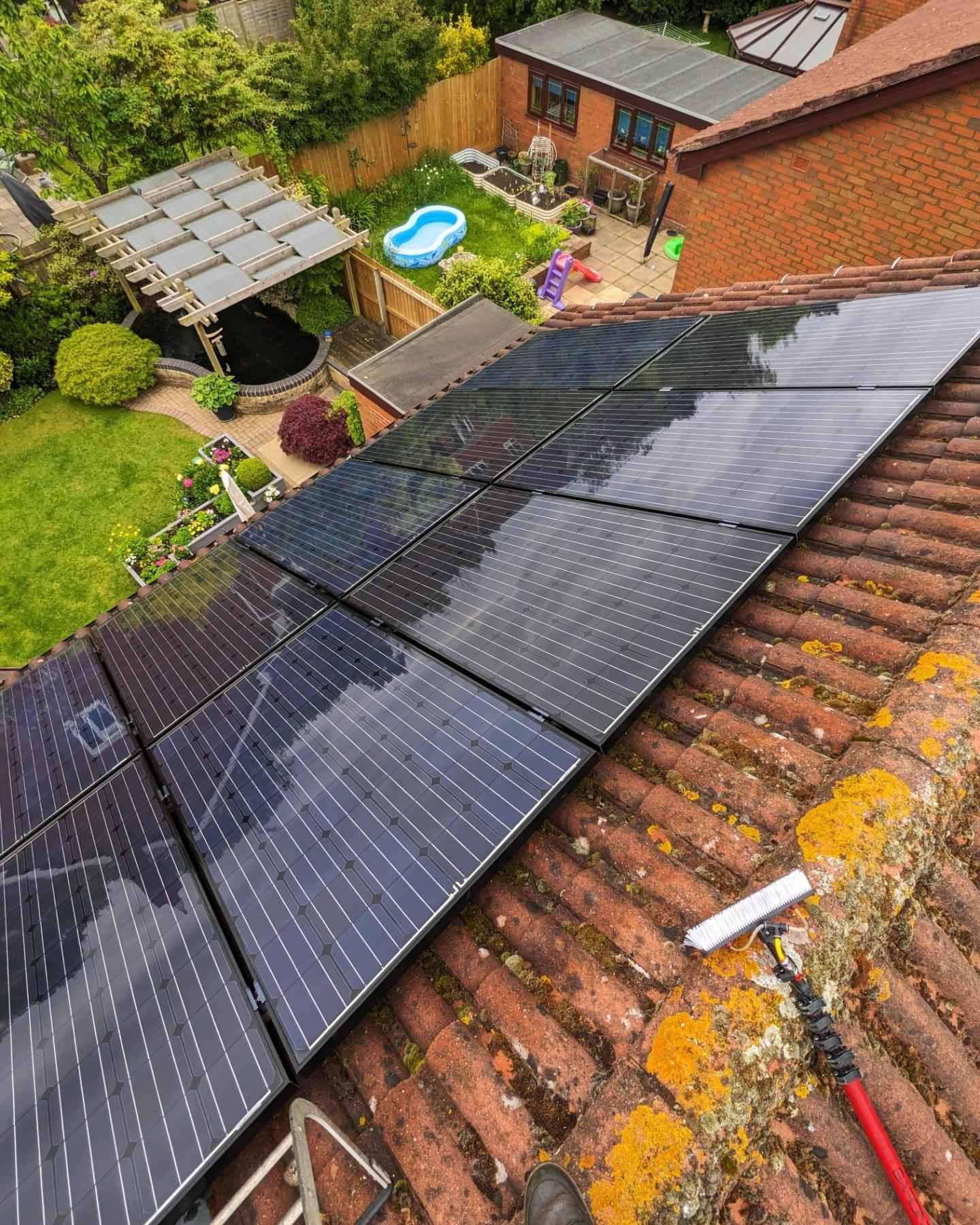 Clean solar panels on family home
